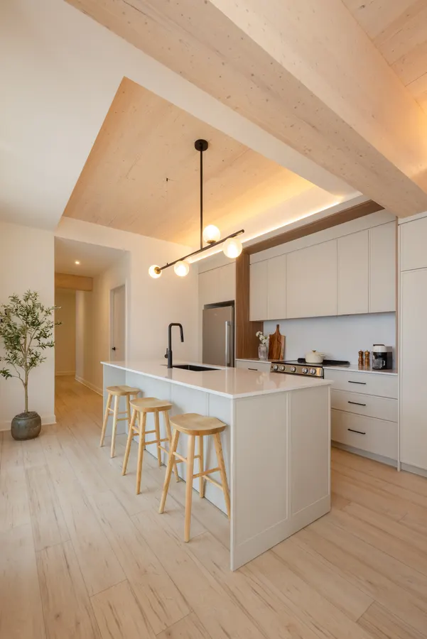 Kitchen and dining area with pendant lights