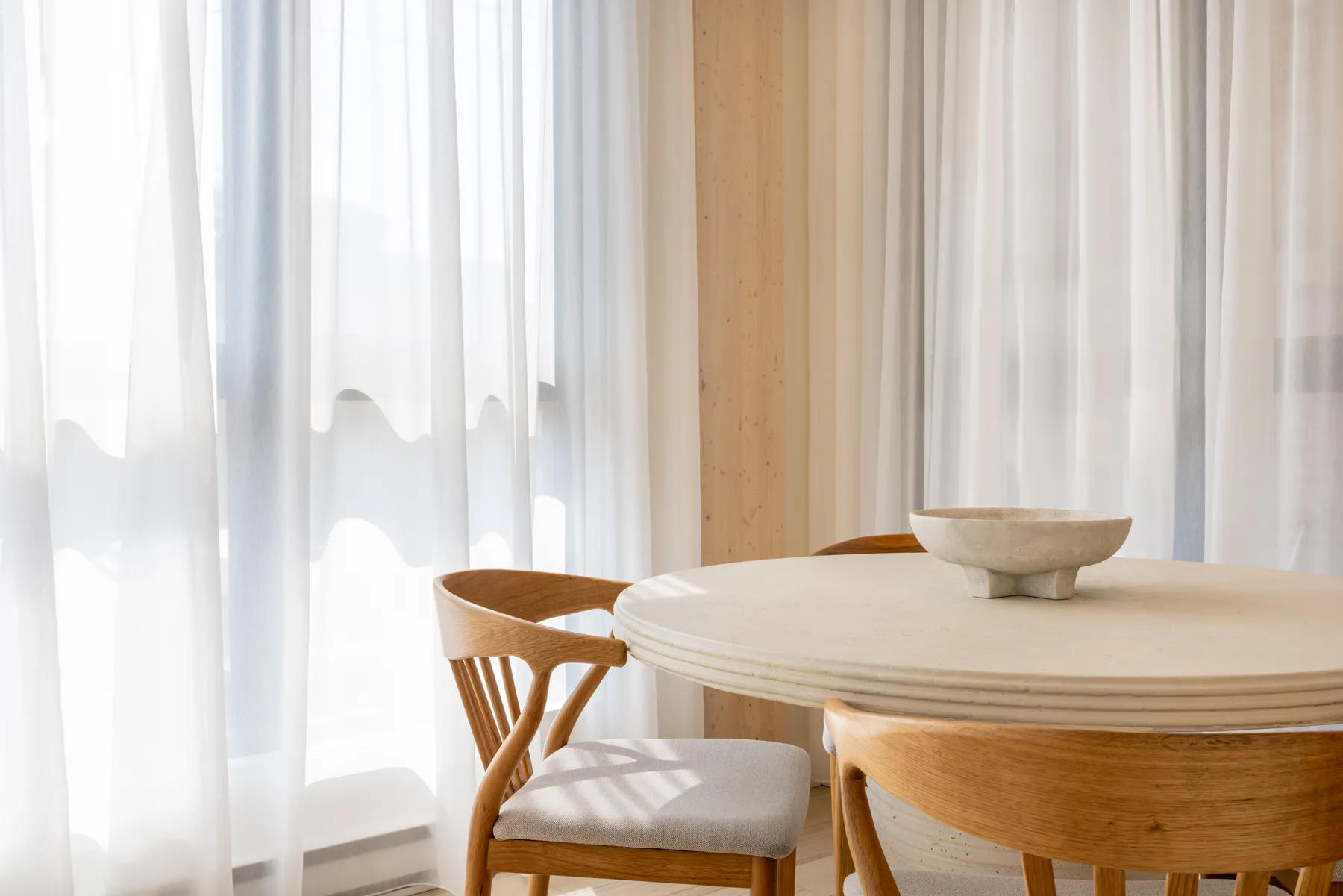 Dining table by the windows at ANDAS