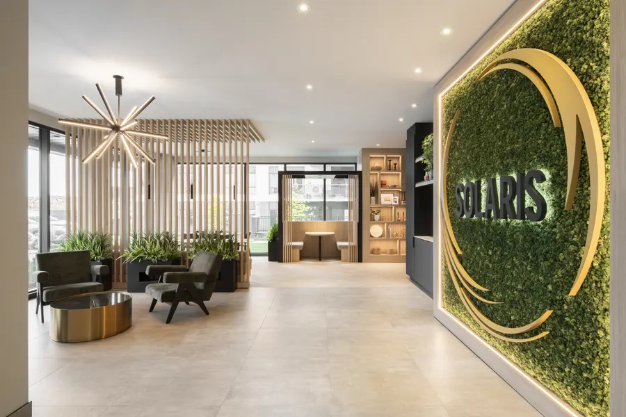 Lobby lounge with a wall of preserved lichen