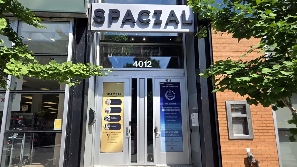 Spacial's door at 4012 rue Wellington, under its sign