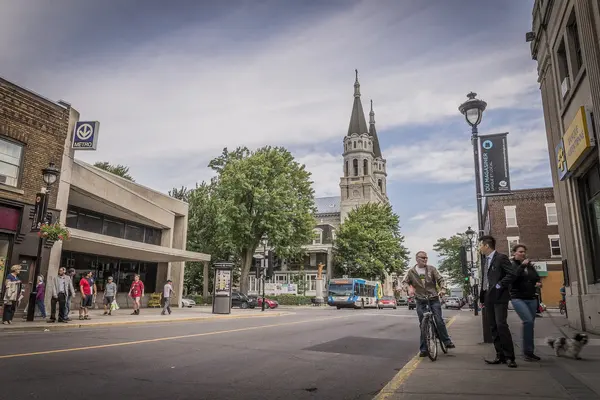 Corner of Wellington and De l'Église, with the church spires